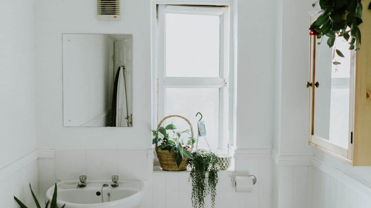 Modern bathroom with large-format tile floor and radiant heated flooring in a Vancouver, WA home
