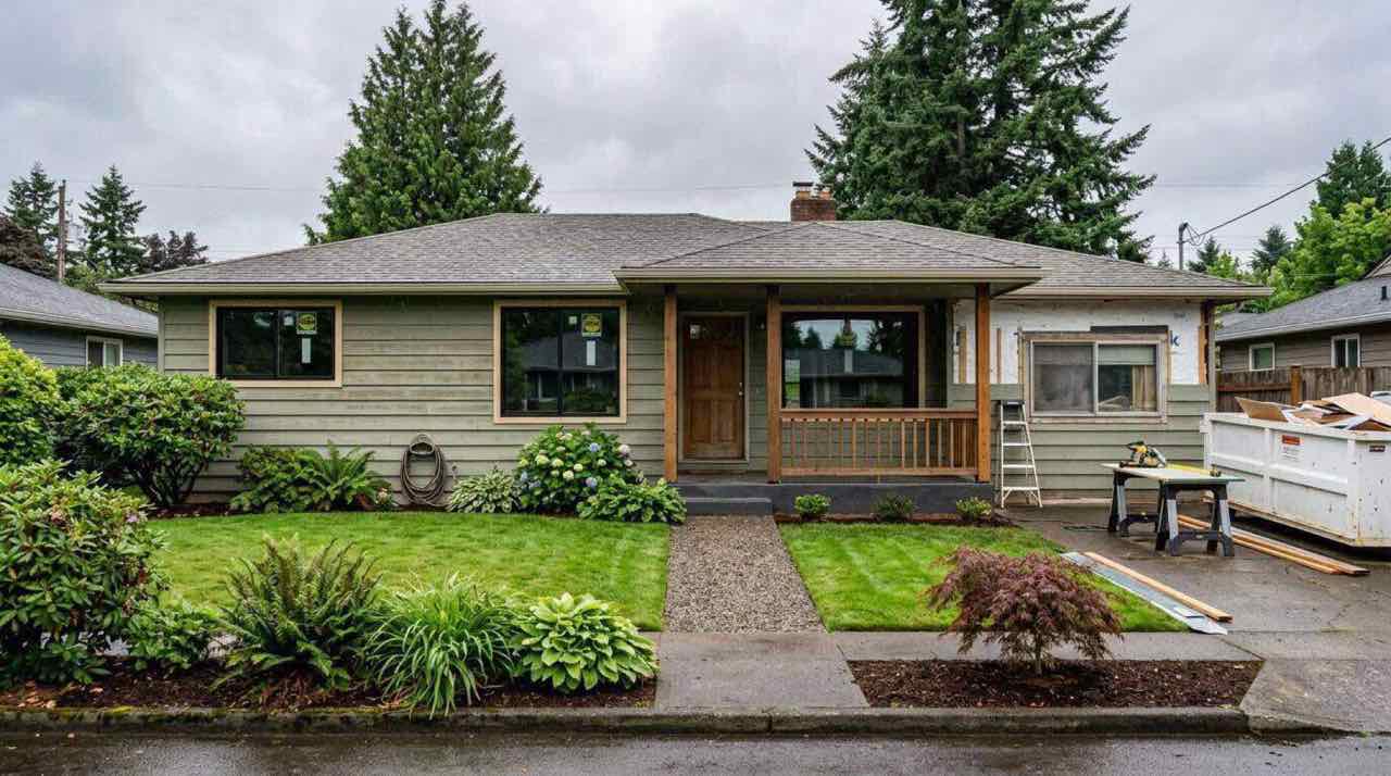 Single-story ranch-style home exterior with modern landscaping in the Pacific Northwest