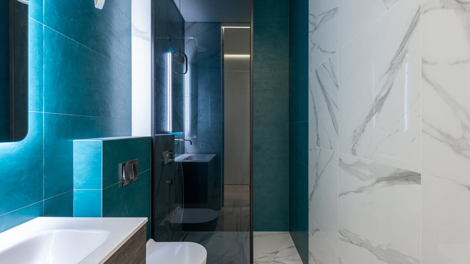 Modern luxury steam shower and home sauna wellness bathroom with warm wood and natural stone in a Vancouver, WA home